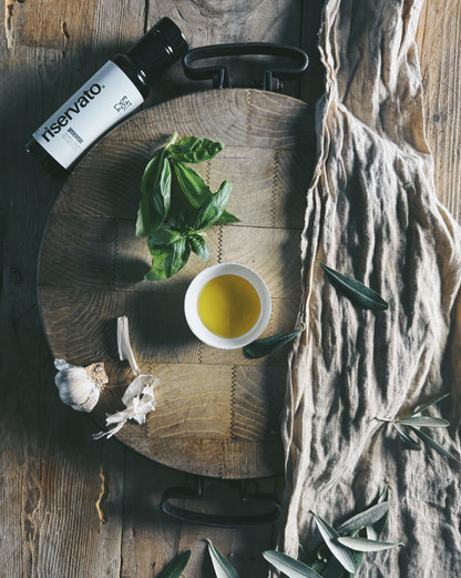 RISERVATO condimento a base di olio extravergine di oliva